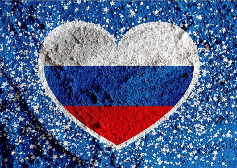 A heart-shaped image with the Russian flag colors (white, blue, red) in the center, surrounded by a blue background filled with white stars.